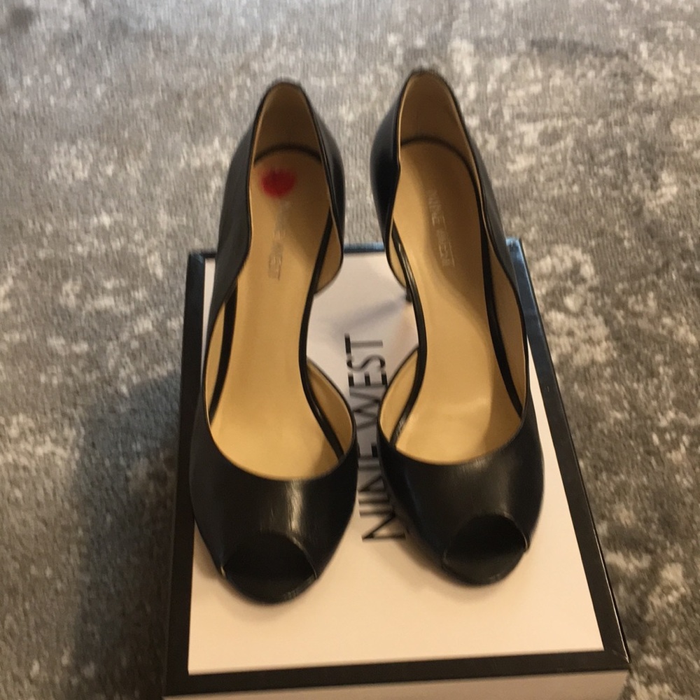 Black peep toe pumps